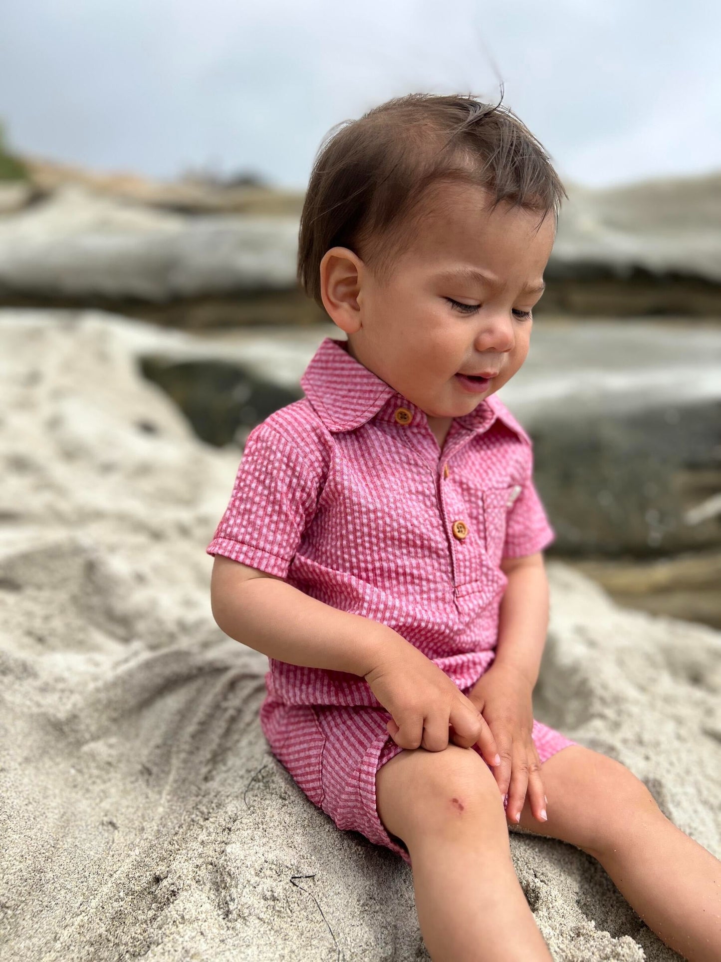 Me & Henry Sandy Coral Seersucker Polo Romper