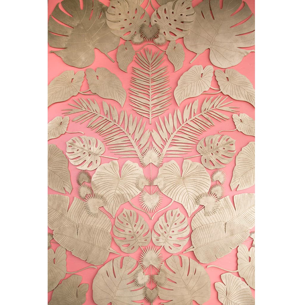 A wooden Monstera Leaf cut out photographed here with other cut outs featuring different leaf designs.
